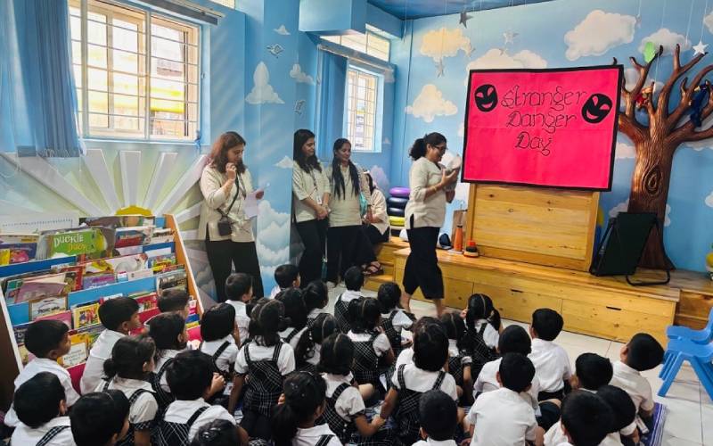 Kids participating in role-play safety activities